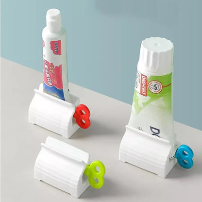 Mini Rolling Tube Toothpaste Squeezer Dispenser Seat Holder Stand Easy Cleaning Bathroom Products Household Cosmetics Squeezer [DSP]